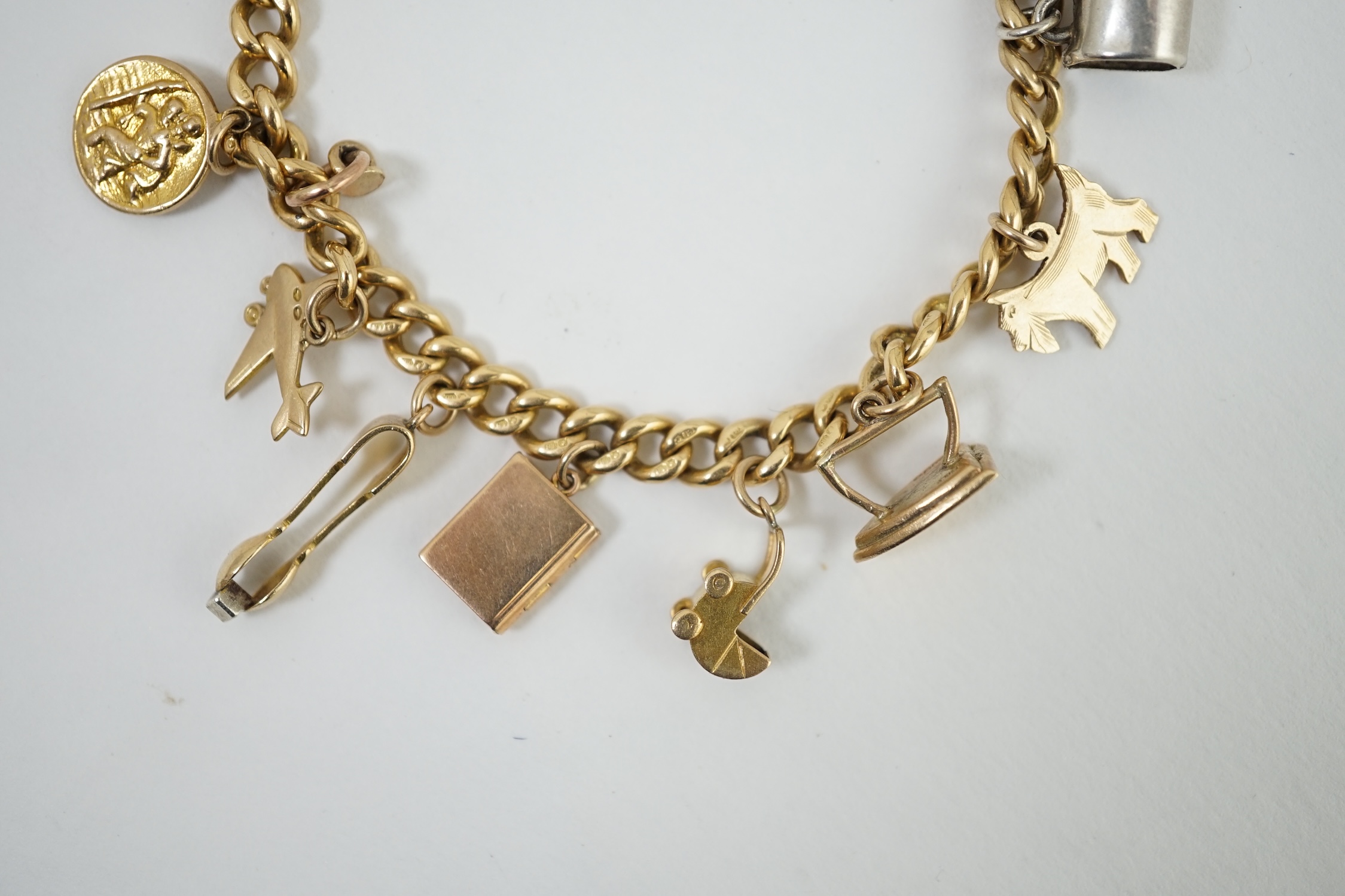 A 18ct gold charm bracelet